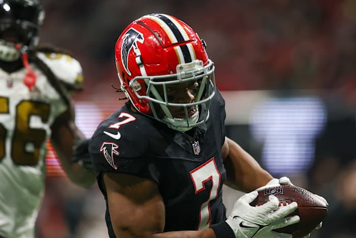 Nov 26, 2023; Atlanta, Georgia, USA; Atlanta Falcons running back Bijan Robinson (7) catches a touchdown pass against the New Orleans Saints in the second half at Mercedes-Benz Stadium.